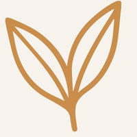 Gold leaf symbol on a beige background