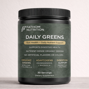 Fathom Nutrition Daily Greens supplement container on a light background