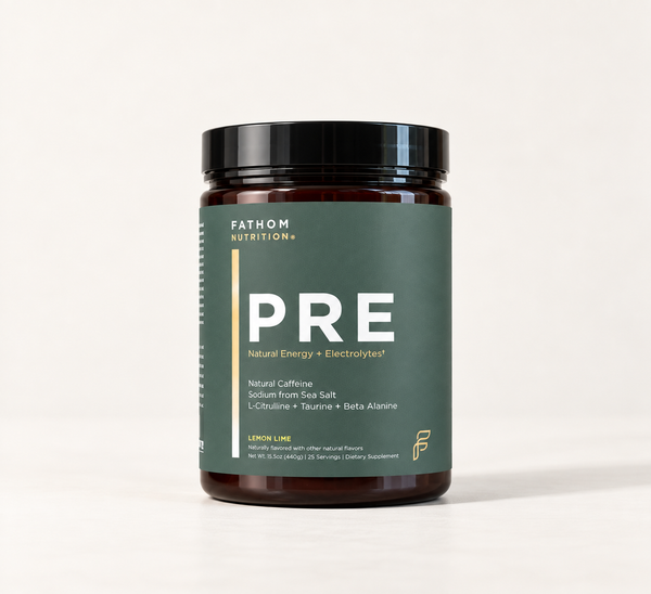 A dark amber supplement bottle with a black lid and a dark green label reading FATHOM NUTRITION PRE, photographed on a clean white studio background.